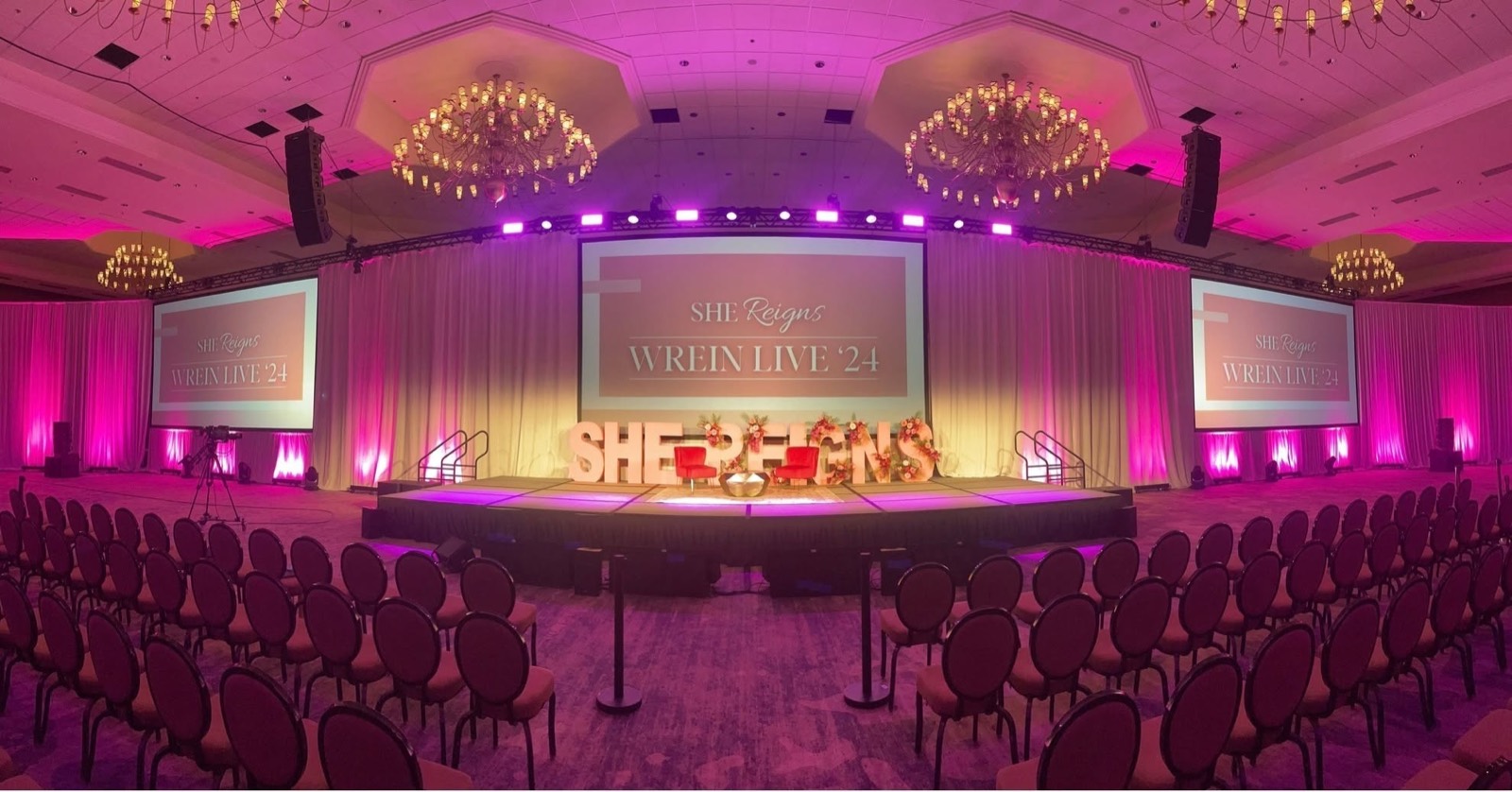 A large branded corporate conference stage planned by CM Promotions